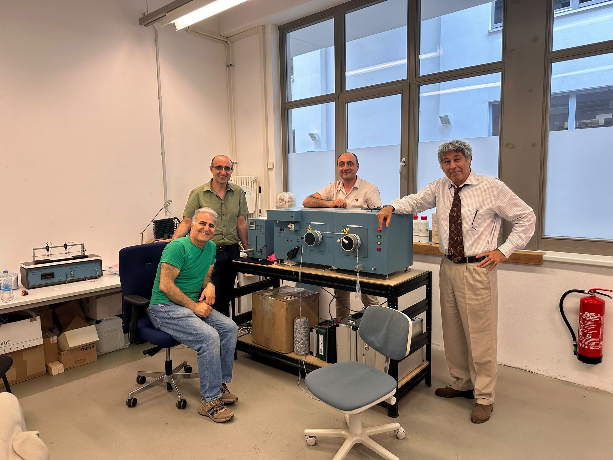 EPCOTEC engineering team with a compact pilot machine